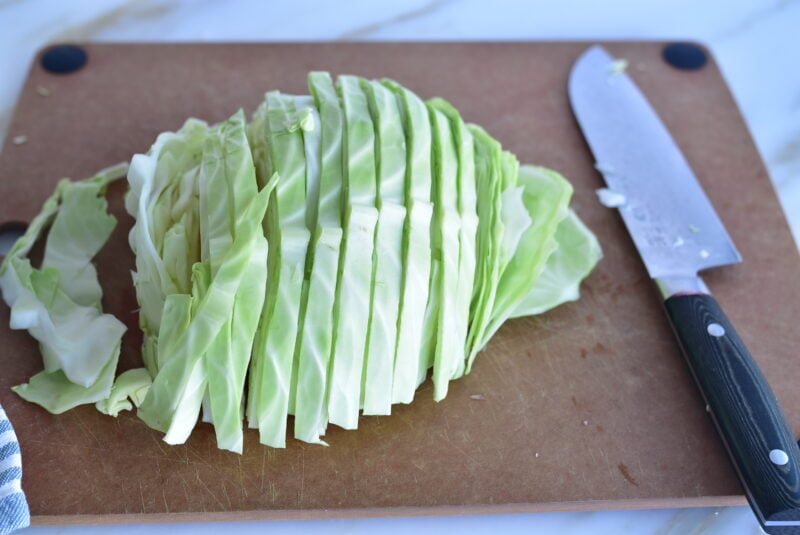 Cabbage sliced on a cutting board