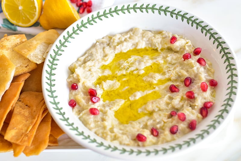 Baba Gannouj in a bowl with pomegranate seeds