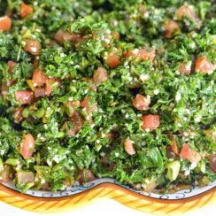 Tabbouleh salad in a dish with yellow trim