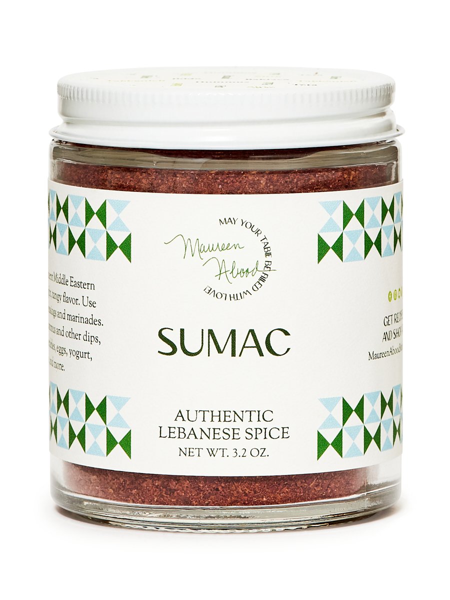 Jar of sumac spice with white, green and blue label
