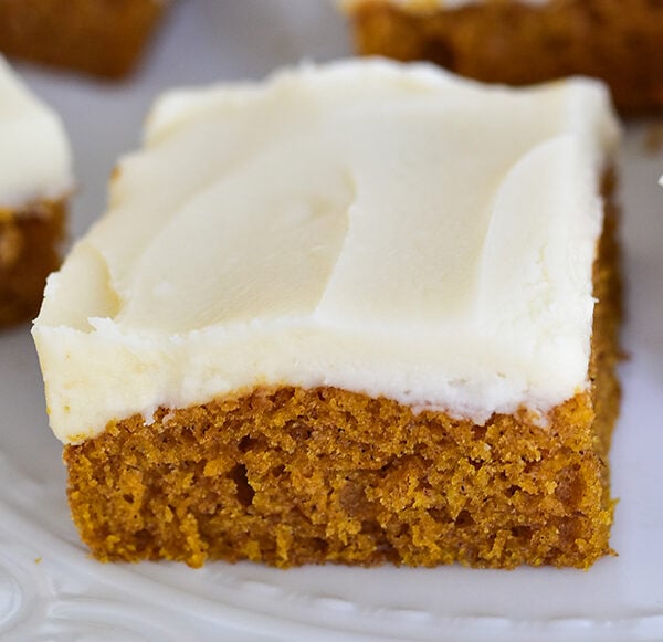 frosted pumpkin bars with white frosting