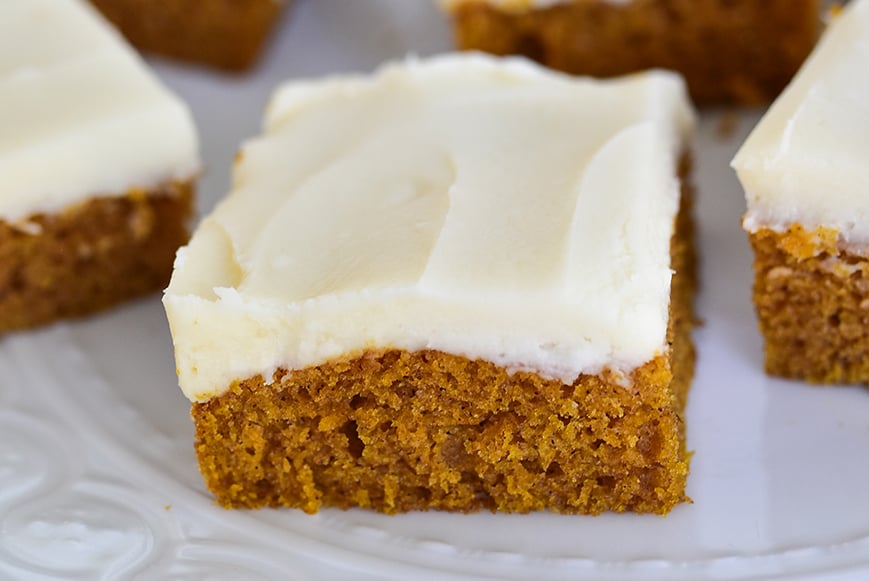frosted pumpkin bars with white frosting