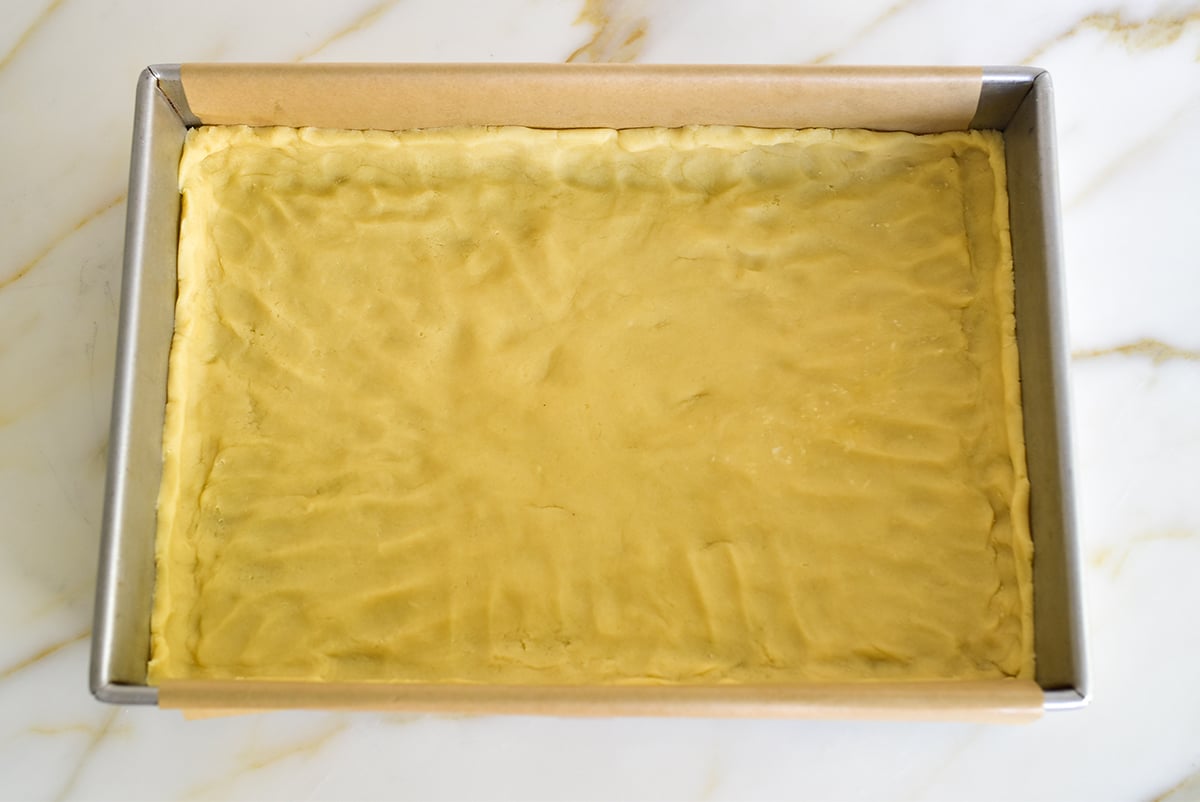 Pie dough that has been pressed into a pan