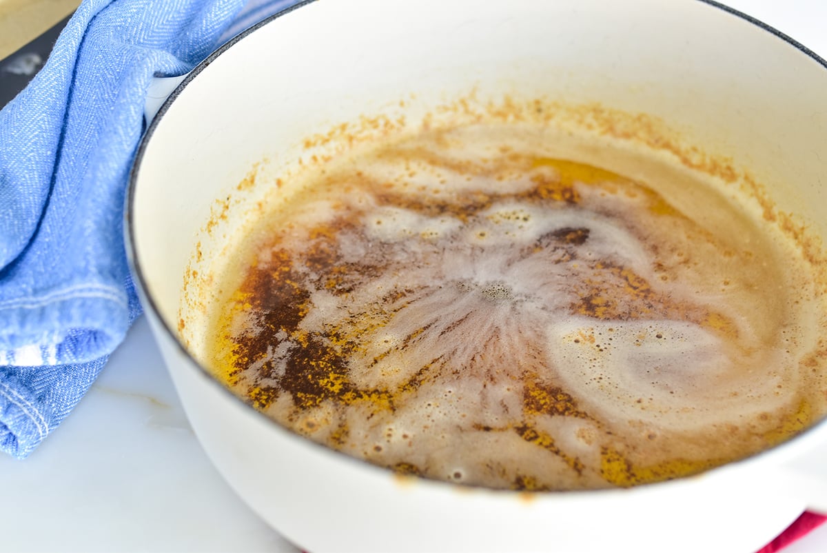 browned butter in a white pan