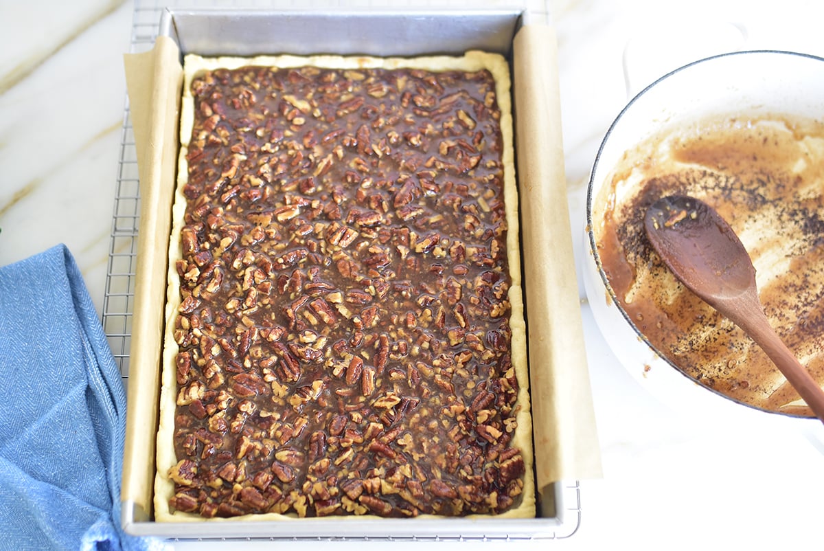 Crust with pecan pie filling just before baking