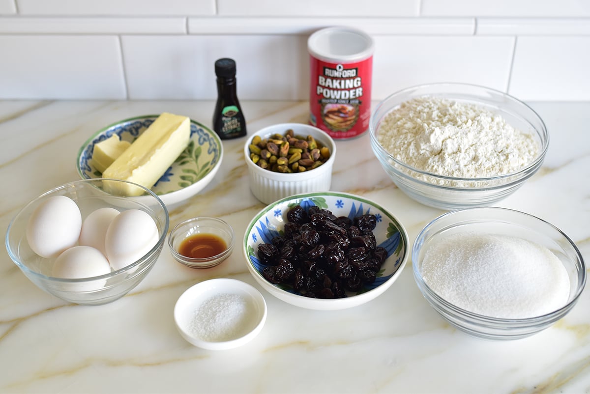 Ingredients for biscotti on a marble countertop
