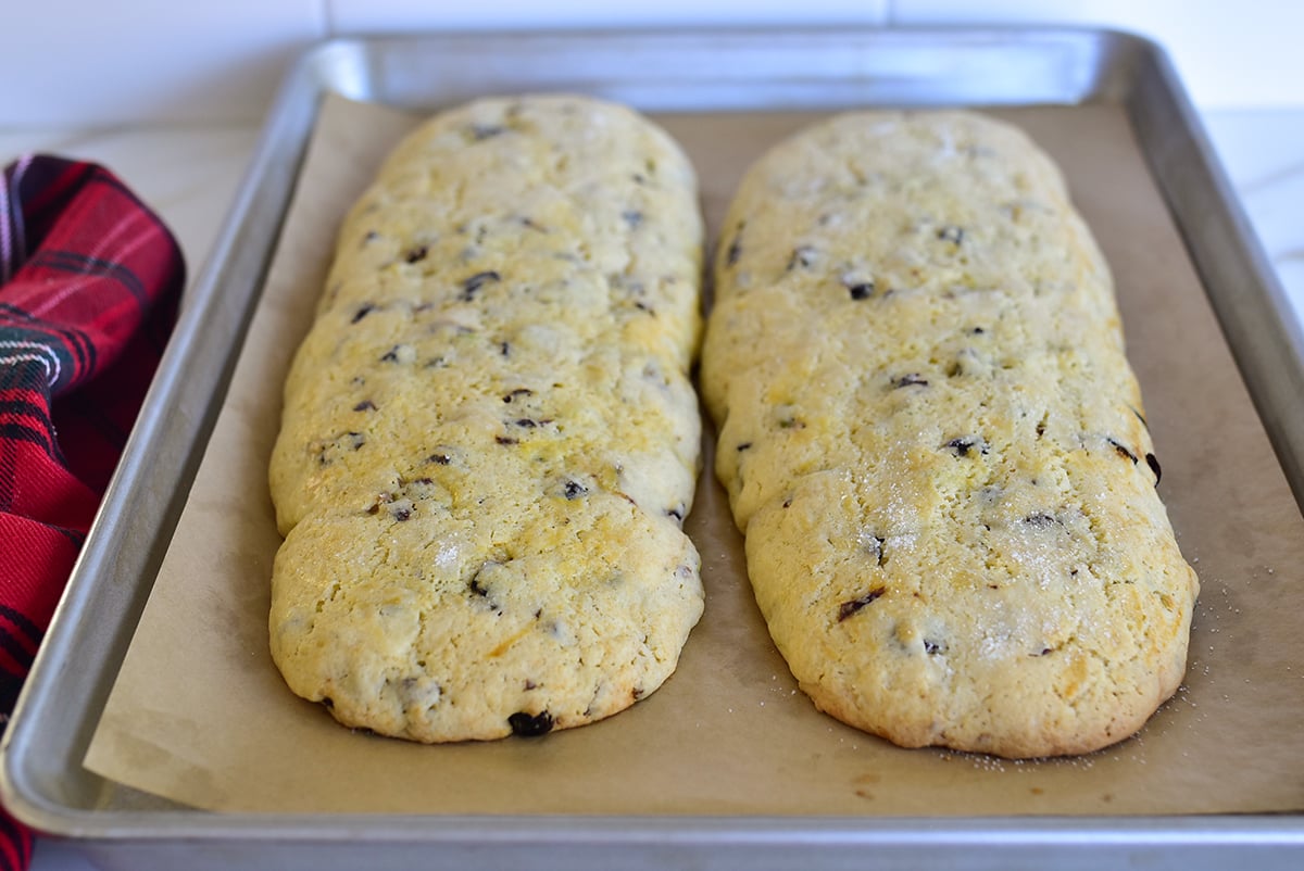 Biscotti logs after the first bake on a baking sheet