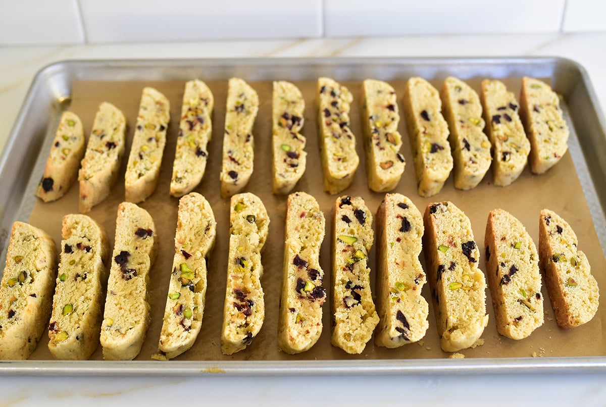 Biscotti on a baking sheet with parchment paper