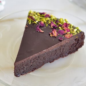flourless chocolate cake wedge on a plate