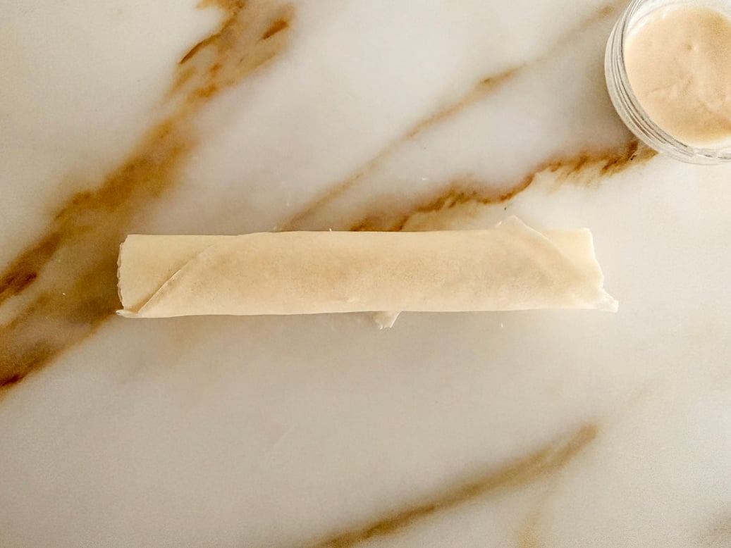 rolled cheese roll on marble