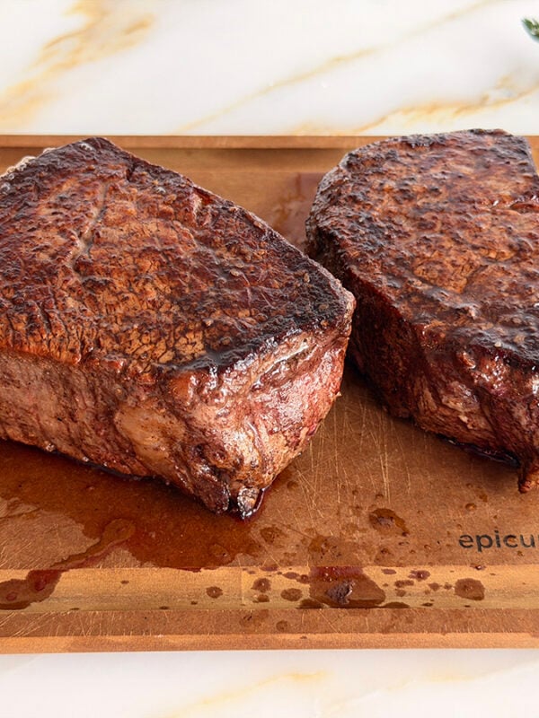 2 large Filet mignon on a cutting board
