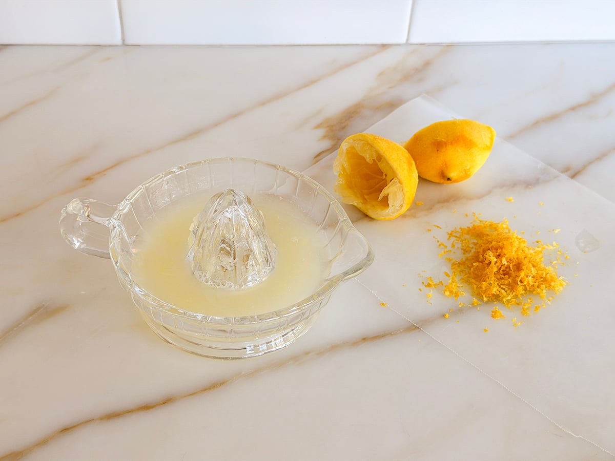 Lemon juice with juiced lemon on the side