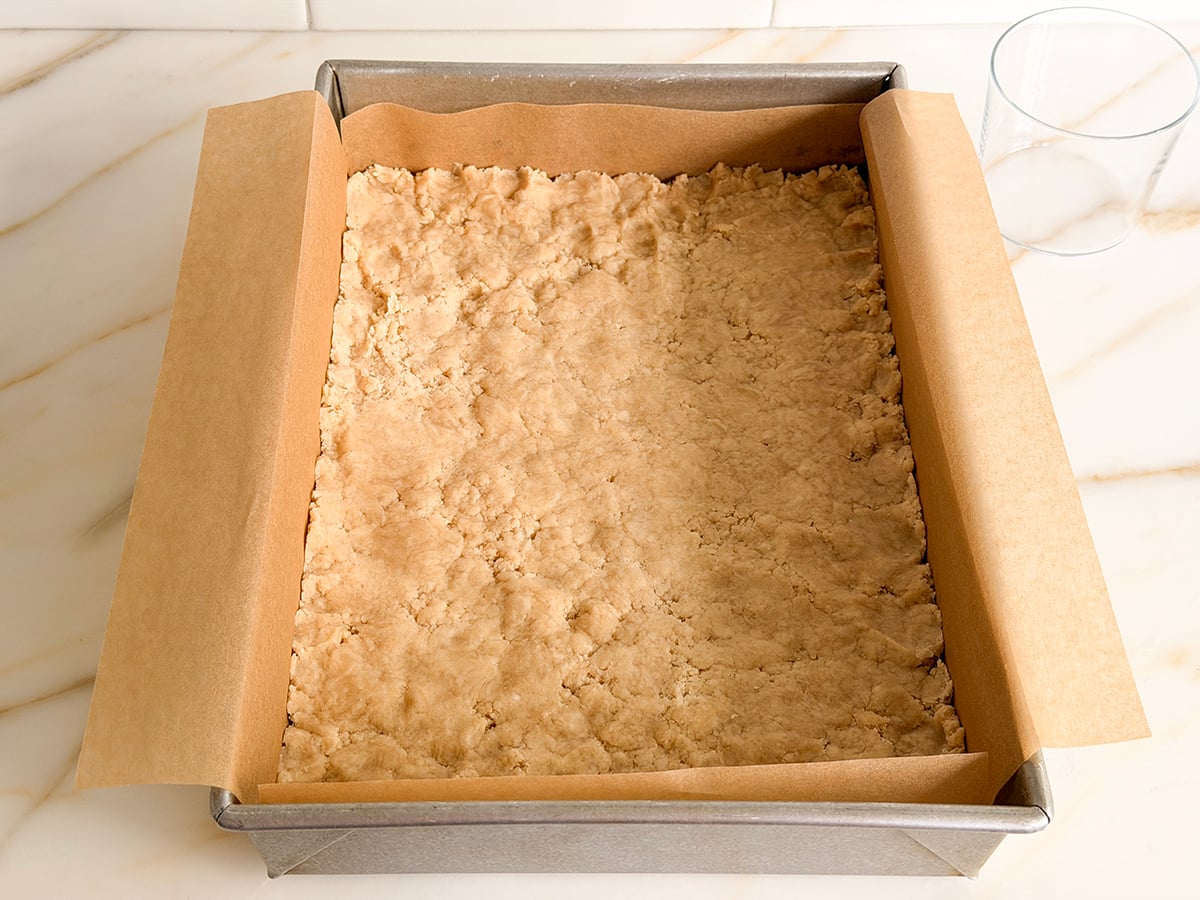 Pressed dough in a parchment lined pan