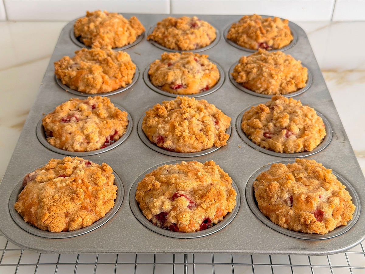 Baked strawberry muffins in a muffin tin