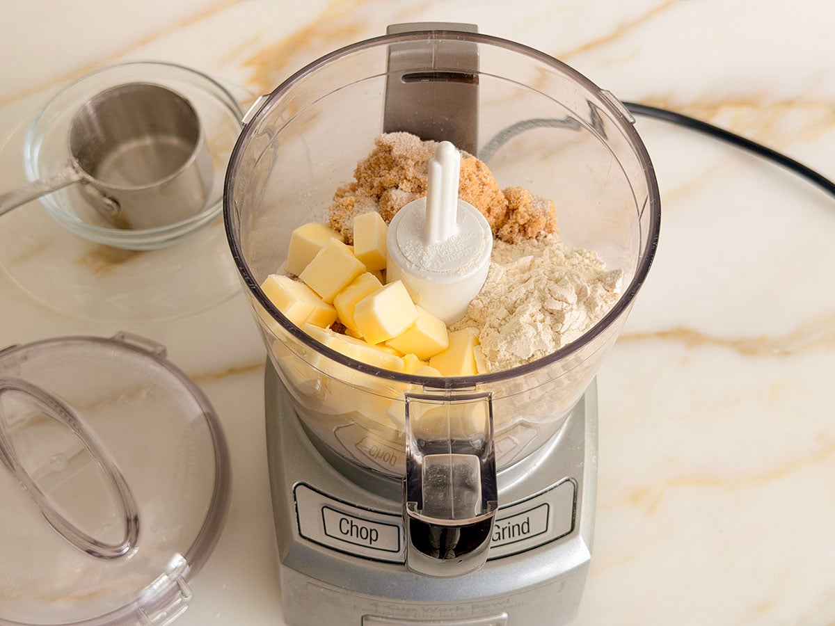 Ingredients for crumb topping in a food processor