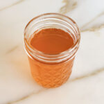 Ghee melted in a glass jar
