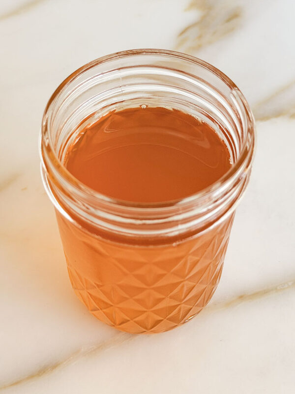 Ghee melted in a glass jar