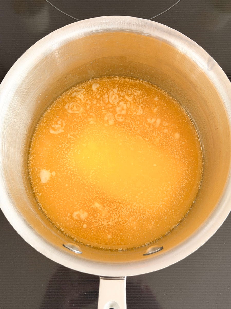 Butter melting in a steel pot